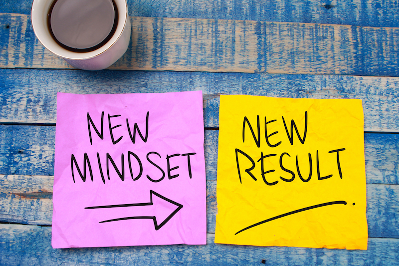 Sticky notes saying new mindset = new results